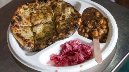 The original menu was a single dish — aloo kulcha with lightly spiced chole and sirke-wali-pyaaz, chopped. The chole was made without oil, ghee, onion, tomato, garlic or ginger, seasoned instead with a special Amritsari masala and light spices. (Express Photo by Akash Patil)