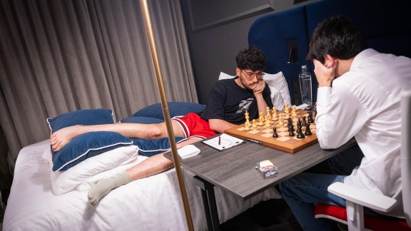 Alireza was asked to play from a bed in a hotel room with his opponent sitting across a physical board and an arbiter designated in the room to keep a mindful eye on them. (Pic Credit: Lennart Ootes)