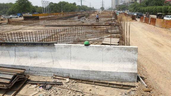 The 700-metre-long underpass will run parallel to the Taj Highway and connect Greater Noida (Surajpur) and Gaur City. (Express Photo by Gajendra Yadav)