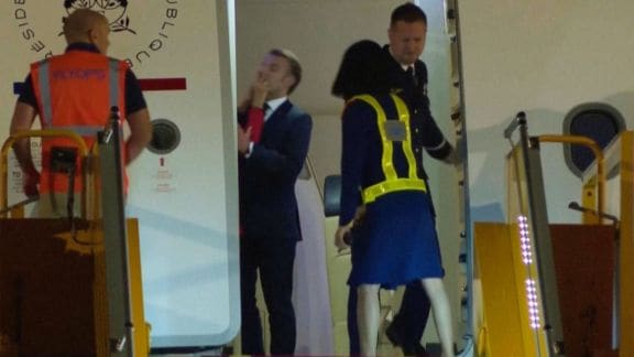A new book on French President Emmanuel Macron and Brigitte Macron claims the viral airplane incident in Vietnam followed a disagreement over messages exchanged with actor Golshifteh Farahani. (AP Photo/Hau Dinh)