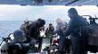 This image released by the Maldives President's Media Division, shows divers preparing to search for the four missing Italian divers near Alimathaa Island, Vaavu Atoll, Maldives, Saturday, May 15, 2026. (Maldives President's Media Division via AP)