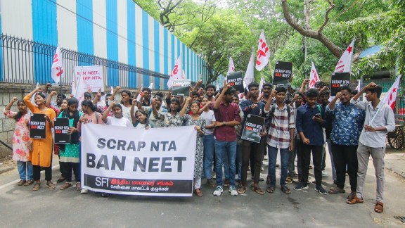 SFI stage a protest demanding the abolition of the NEET examination in Chennai