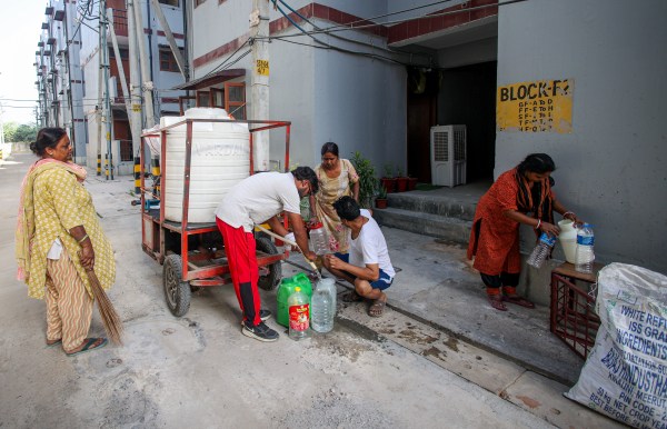 Savda Ghevra, Savda Ghevra families relocated, families relocated from slums, families relocated from slums near PM residence, jhuggi dwellers, DUSIB flats, DUSIB flats in Savda Ghevra, delhi news, India news, Indian express, current affairs