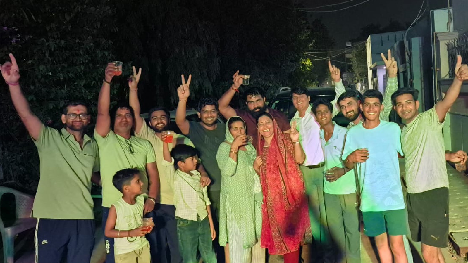 Prince's mother Santosh and cousins celebrate outside their home in Dariyapur Khurd after he was named in the India squad. (Photo by special arrangement)