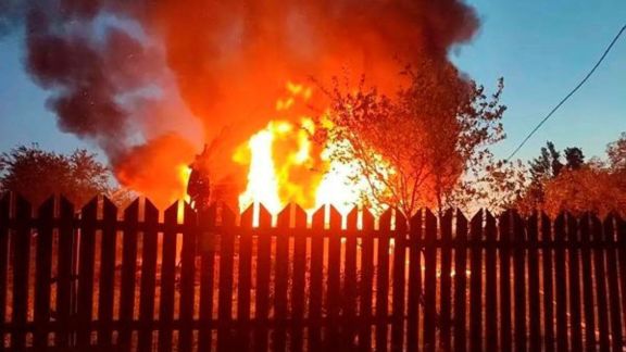 This photo released by Moscow Region Governor Andrei Vorobyev's official telegram channel shows a house on fire after a Ukrainian attack in Khimki, just outside Moscow, Russia, on Sunday, May 17, 2026.