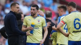File image of Southampton's coach Tonda Eckert, left, talks to his players during the FA Cup semifinal soccer match between Manchester City and Southampton in Manchester, England, Saturday, April 25, 2026. (AP Photo)