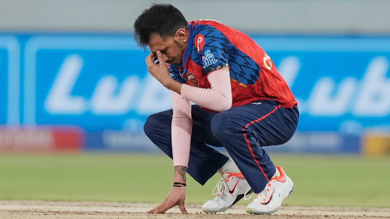 PBKS' Yuzvendra Chahal reacts after a catching chance was put down by Lockie Ferguson during the Indian Premier League cricket match between Sunrisers Hyderabad and Punjab Kings in Hyderabad. (AP Photo)