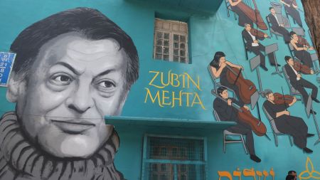 Zubin Mehta wall mural at Lodhi Colony area in New Delhi on Friday (Express Photo by Amit Mehra)