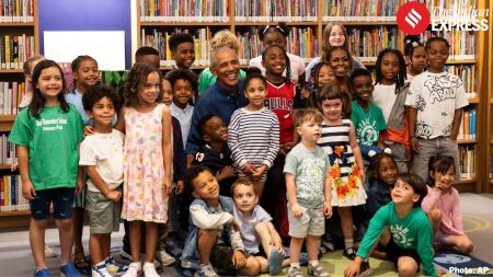 The Obamas with the 25 school children