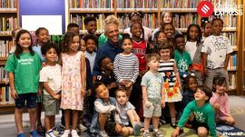 The Obamas with the 25 school children