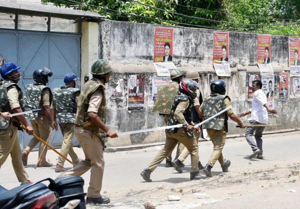 Heavy Police force deployed also Lathi charge during Lucknow Municipal Corporation demolishing allegedly unauthorised chambers near the High Court complex in Kaiserbagh area of Lucknow.Heavy Police force deployed also Lathi charge during Lucknow Municipal Corporation demolishing allegedly unauthorised chambers near the High Court complex in Kaiserbagh area of Lucknow. (Express Photo by Vishal Srivastav)