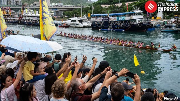Guided by the thunderous beat of their drummers, crews pulled their paddles through the water in unison