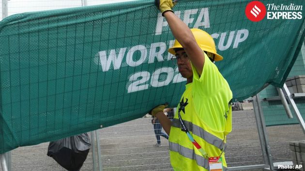 A worker carries a barrier of the FIFA World Cup at the stadium in Guadalajara, Mexico on Wednesday, June 10, 2026