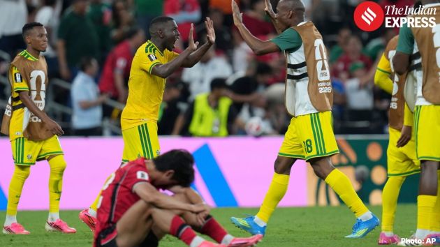 Samukelo Kabini (18) celebrates with teammate Aubrey Modiba (6) after the World Cup Group A soccer match between South Africa and South Korea in Guadalupe