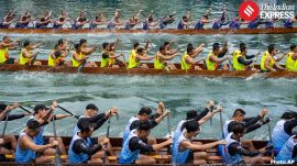 Competitors take part in the Aberdeen Dragon Boat Race to celebrate the Dragon Boat Festival in Hong Kong