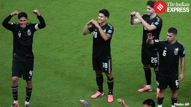 Mexico players celebrate after securing a hard-fought 1-0 victory over South Korea