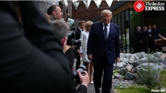 President Donald Trump arrives for a group photo at the G7 summit
