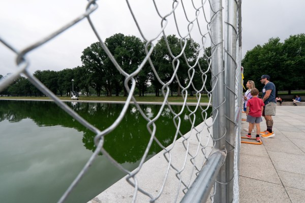 People visit the fenced-off Reflecting Pool as preparations to celebrate the 250th anniversary of US Independence continue near the Lincoln Memorial on the National Mall in Washington, D.C., June 28, 2026. (REUTERS)