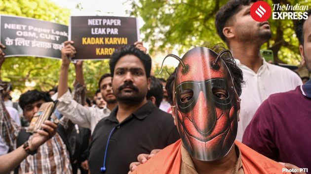 Hundreds of people, mostly young individuals, turned out for the demonstration, many of whom were wearing cockroach masks
