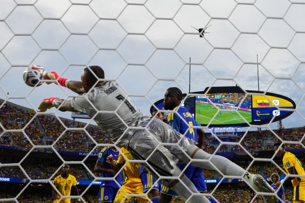 Curaçao goalkeeper Eloy Room (1) makes a save during the World Cup Group E match between Ecuador and Curacao in Kansas City. (AP Photo/Ed Zurga)