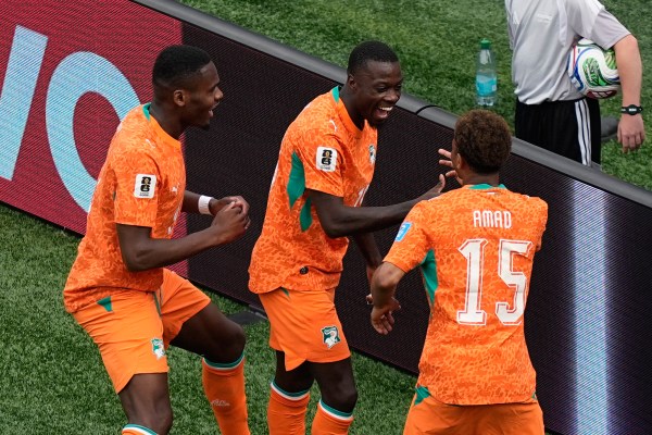 Ivory Coast's Nicolas Pepe, center, celebrates after scoring the opening goal during the World Cup match between Curacao and Ivory Coast. (AP Photo/Matt Slocum)