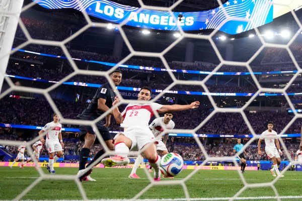 Turkey's Kaan Ayhan, second from right, scores their third goal against United States. (AP Photo/Mark J. Terrill)
