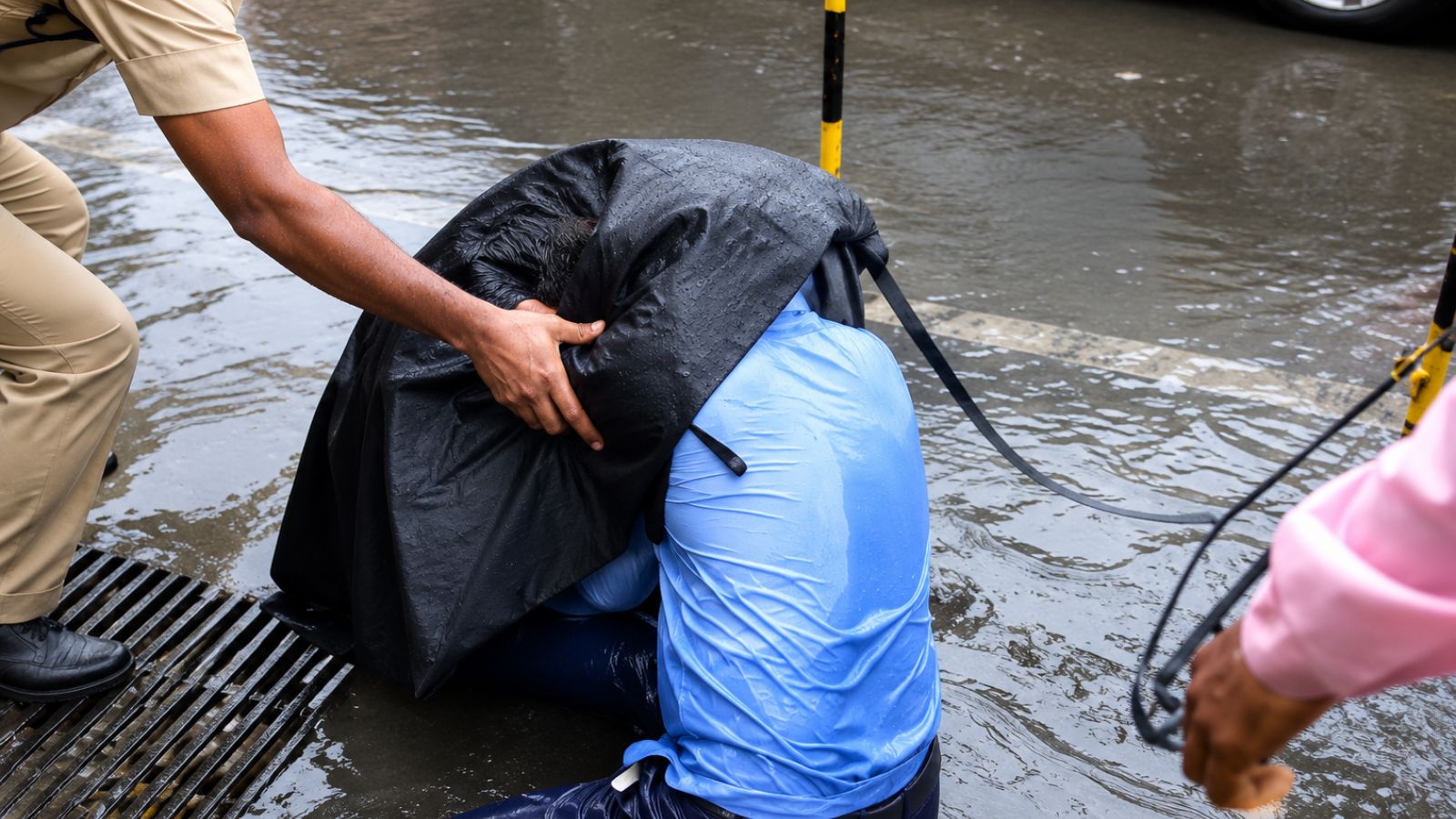 As Mumbai Mayor inspects flooding, BMC official falls into open manhole