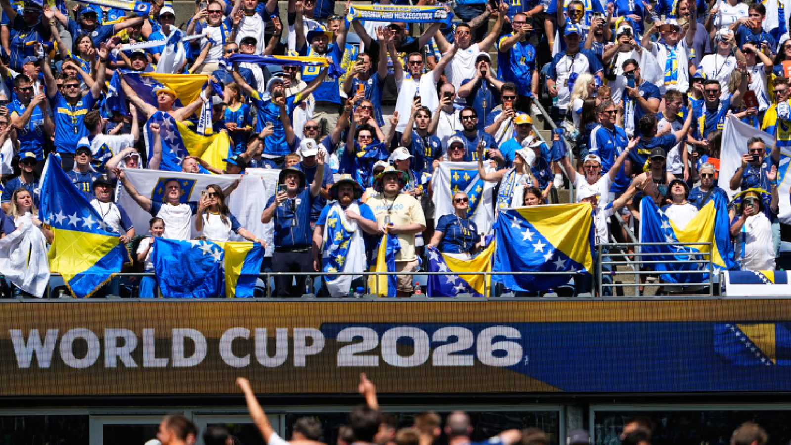 Bosnian fans celebrate after the World Cup Group B soccer match between Bosnia and Qatar in Seattle, Wednesday, June 24, 2026. (AP Photo/Maddy Grassy)