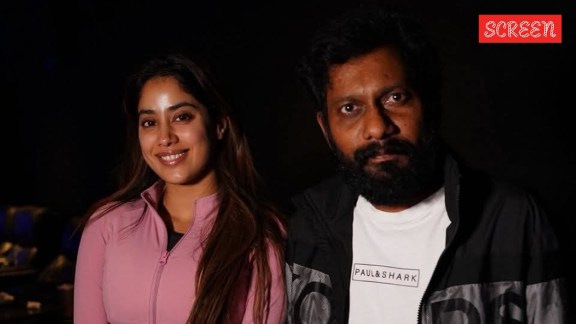 Peddi's director Buchi Babu Sana with actress Janhavi Kapoor