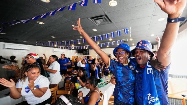 Cape Verde supporters celebrate the opening goal for their team as they watch the World Cup Group H match vs Uruguay at a restaurant at a Cape Verde community in Brockton, Mass. near Boston. (AP)