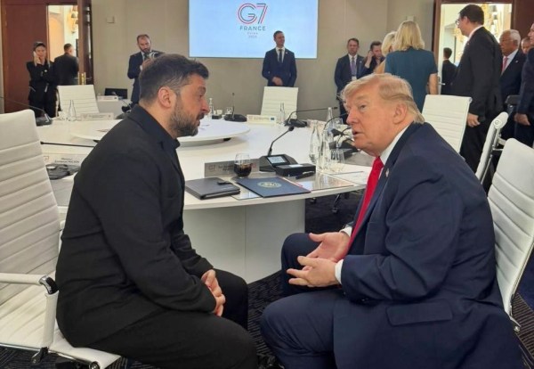 Ukrainian President Volodymyr Zelenskyy, left, and US President Donald Trump speak during a meeting at the G7 summit in Evian-les-Bains, France, Tuesday, June 16, 2026. 