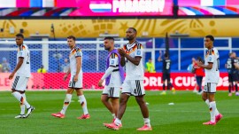 Germany's Jonathan Tah (4) and teammates acknowledge the crowd after a loss during the World Cup round of 32 soccer match between Germany and Paraguay in Foxborough. (AP Photo)