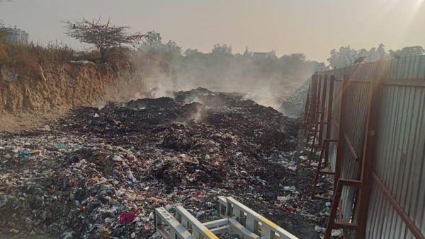 The Municipal Corporation of Gurugram’s (MCG) secondary waste dumping point at Khandsa caught fire on Wednesday night. (Express Photo)