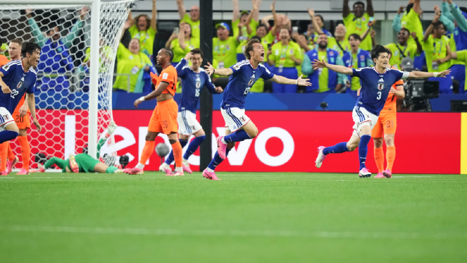 Japan's Koki Ogawa (19) and Shogo Taniguchi (3) celebrate their side's second goal against the Netherlands during a World Cup Group F soccer match in Arlington, Texas, near Dallas, Sunday, June 14, 2026. (AP Photo/Julio Cortez)