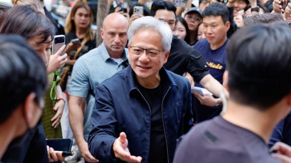 Nvidia CEO Jensen Huang speaks to reporters after arriving at Gimpo International Airport in Seoul, where he said robotics could become South Korea’s next major growth sector and highlighted opportunities in AI-driven manufacturing. (Image: Reuters)