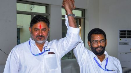 Congress candidate Pranav Jha, left, with Jharkhand Mukti Morcha (JMM) candidate Baidyanath Ram after they cast their votes during the Rajya Sabha elections, at Jharkhand Assembly. (PTI Photo)