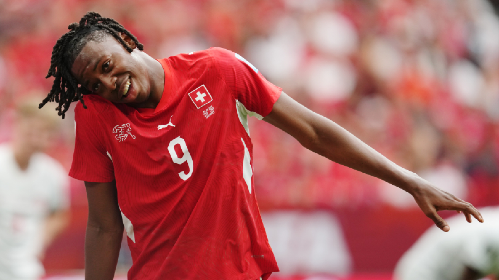 Switzerland's Johan Manzambi (9) celebrates his scoring their second goal during the World Cup Group B soccer match between Switzerland and Canada in Vancouver, British Columbia, Wednesday, June 24, 2026. (Ethan Cairns/The Canadian Press via AP)