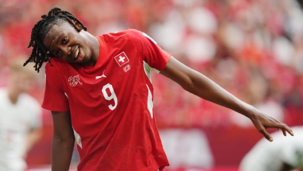 Switzerland's Johan Manzambi (9) celebrates his scoring their second goal during the World Cup Group B soccer match between Switzerland and Canada in Vancouver, British Columbia, Wednesday, June 24, 2026. (Ethan Cairns/The Canadian Press via AP)