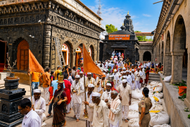 Warkaris at a temple during preparations for the annual Pandharpur pilgrimage, where the PMC has introduced new facilities for devotees. pilgrims