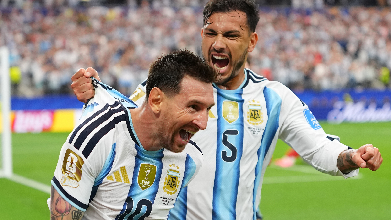 Argentina's Lionel Messi, left, celebrates with Leandro Paredes after scoring his side's second goal during the World Cup Group J soccer match between Argentina and Austria in Arlington, Texas, near Dallas, Monday, June 22, 2026. (AP Photo/Julio Cortez)