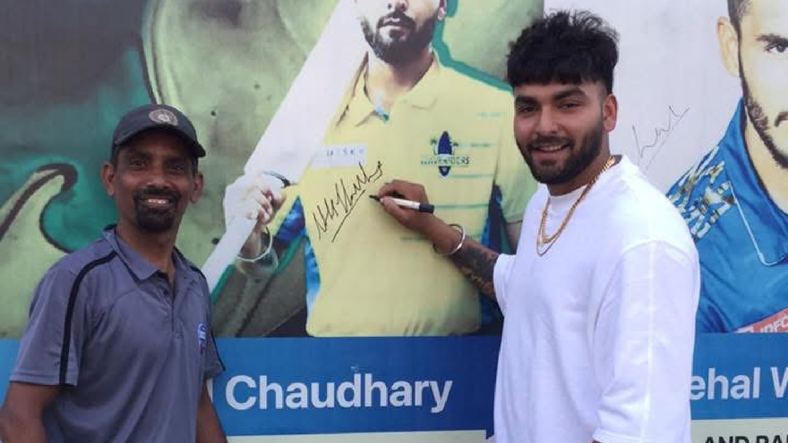 Coach Charanjit Bhangu with Nikhil Chaudhary during one of his visits to Ludhiana at his academy; (Special Arrangement)