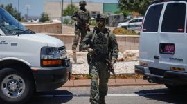Israeli security forces are deployed at the scene of a shooting attack carried out by a Palestinian citizen of Israel near Tzur Yitzhak in central Israel, Sunday, June 7, 2026. (AP Photo)