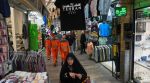 Pedestrians walk through Tajrish Bazaar in Tehran, Iran, Tuesday, April 7, 2026. (AP Photo)