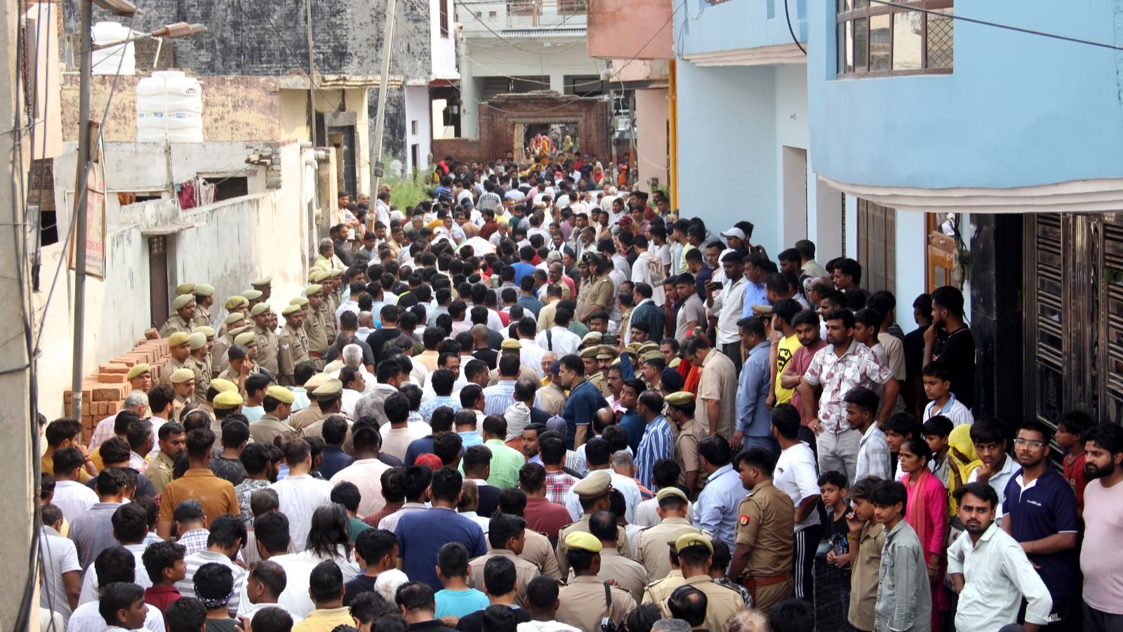 Huge crowds gathered at Chirag’s home Sunday. (Express photo by Shreya Singhai)