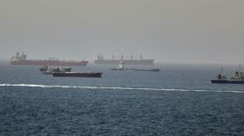 Tankers and cargo vessels are seen in the Gulf of Oman, along shipping routes linking the Strait of Hormuz and the Arabian Sea (AP Photo)