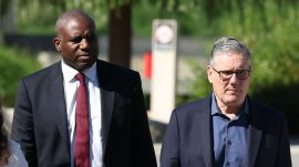 Britain's Prime Minister Keir Starmer walks with Deputy Prime Minister David Lammy, as they visit a housing development in north London, Friday, June 19, 2026. (Peter Macdiarmid/Pool Photo via AP)