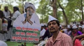The protesters alleged that fertile farmland is being acquired for an airport, industrial estates and mining projects despite opposition from affected villages.