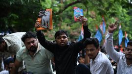 NSUI and Youth Congress workers staged a protest in Bhubaneswar on Thursday alleging errors in school textbooks. (Special Arrangement)
