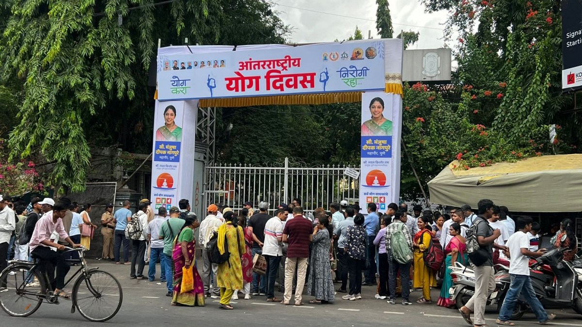 NEET UG retest 2026 Pune college Yoga Day banners