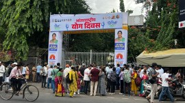 NEET UG retest 2026 Pune college Yoga Day banners